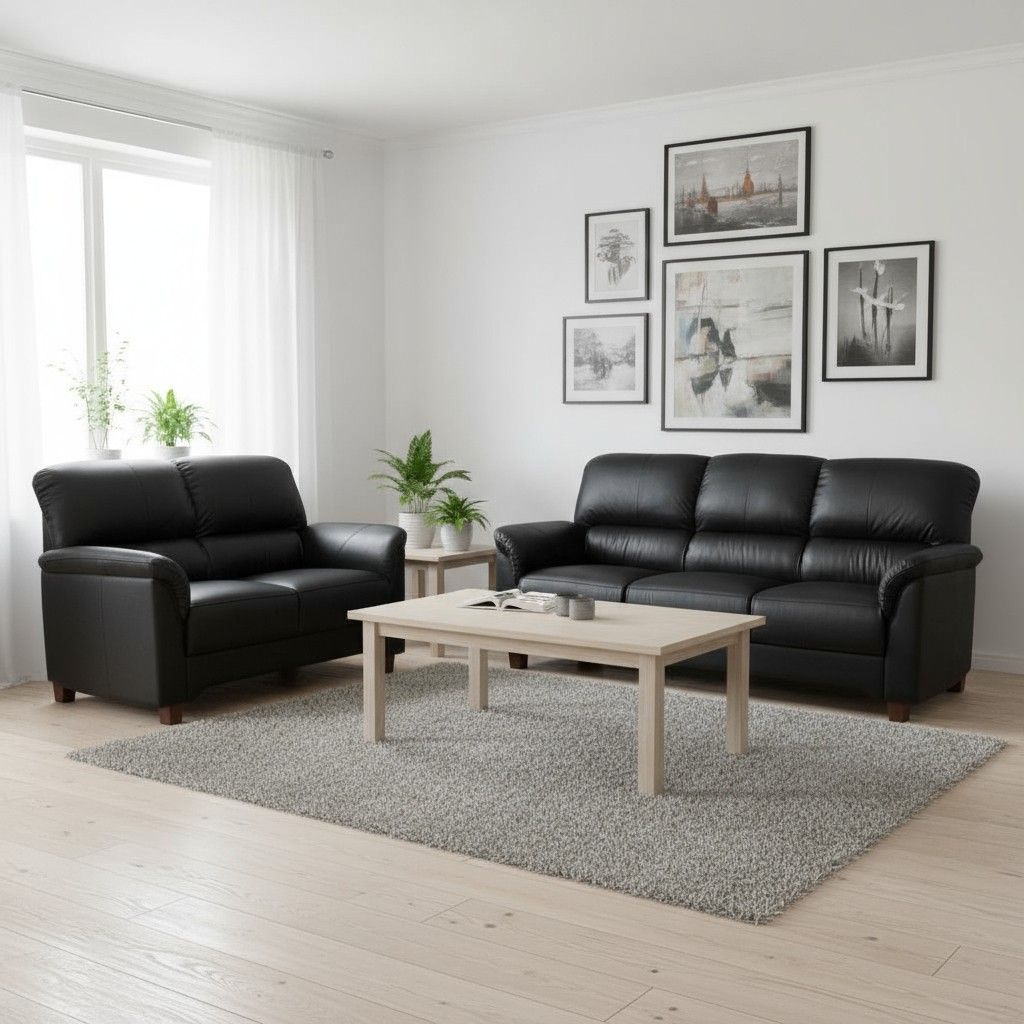Musta nahkasohvakalusto Colibri kuvattuna suomalaisessa olohuoneessa