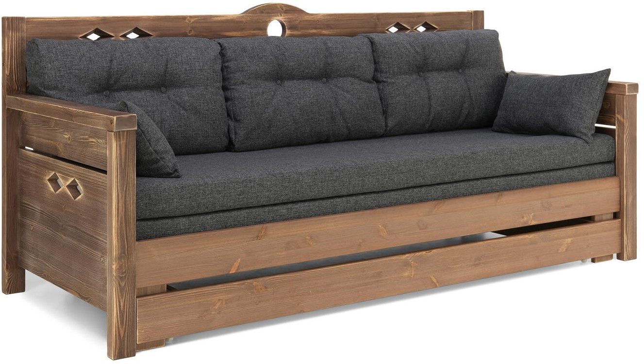 Ruskea Konsta laverisohva, jossa on tummanharmaan väriset patjat ja tyynyt