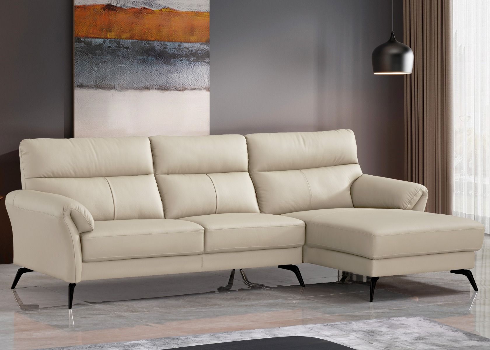 Taupen värinen nahkainen divaanisohva