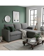 Vuodedivaanisohva Topi tummanharmaana kuvattuna olohuoneessa